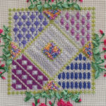 Stitch an intricate tile surrounded by silk ribbon flowers on Cyclamen with Merrilyn Heazlewood